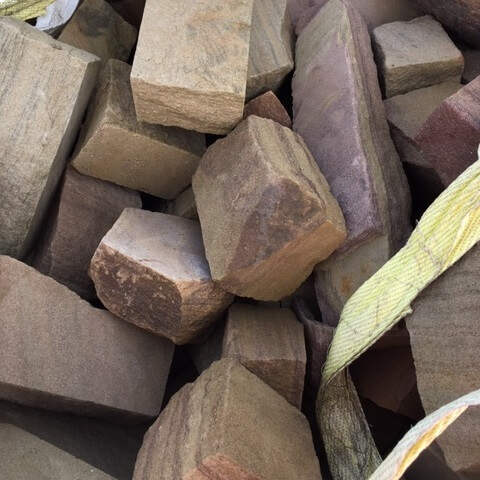 Sandstone blocks in bags for dry stone walling